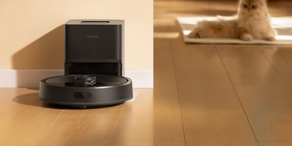 A robot vacuum cleaner on a wood floor