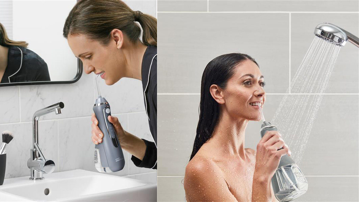 A woman using a sprayer to clean her face