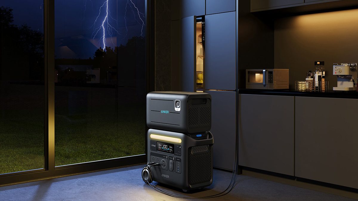 A black rectangular object with a wire plugged into it