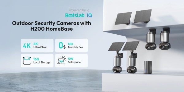 A group of cameras on a white shelf