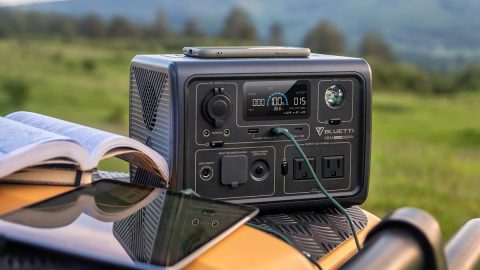 A device with a phone and a book