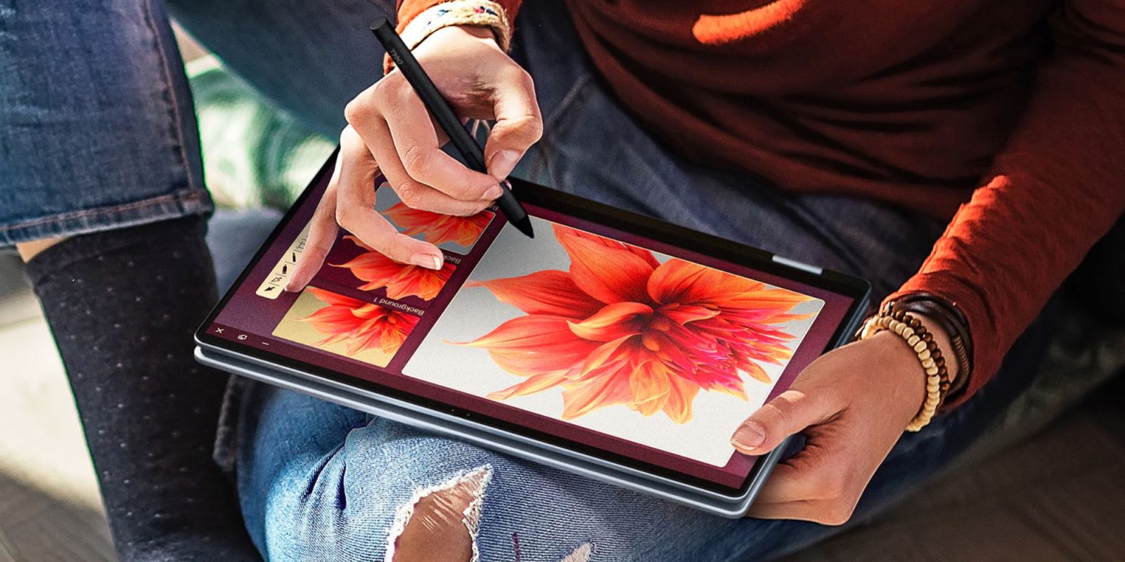 Image showing a person using Dell's 16 Plus 2-in-1 Mini-LED laptop.