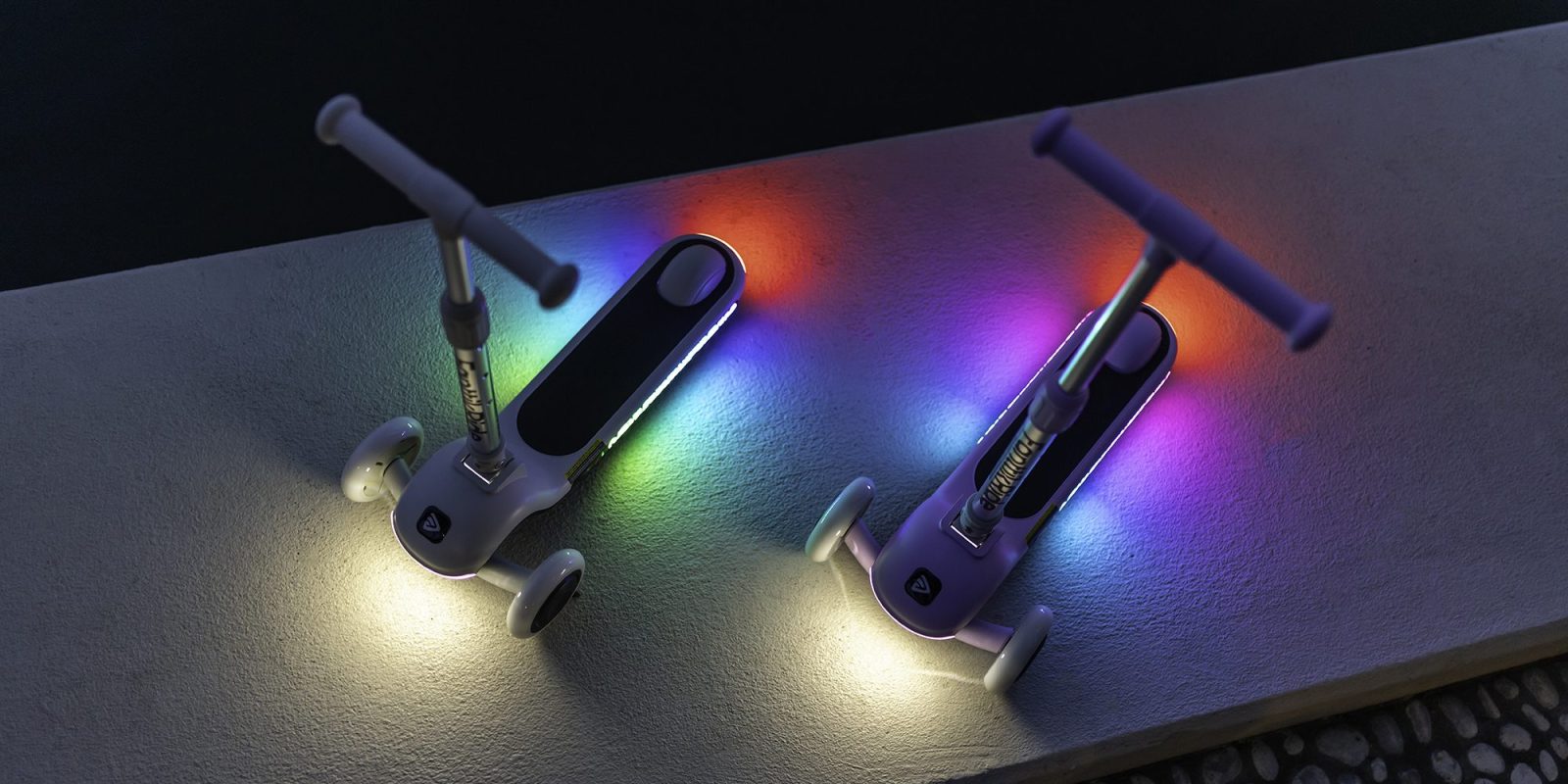 A pair of scooters with lights