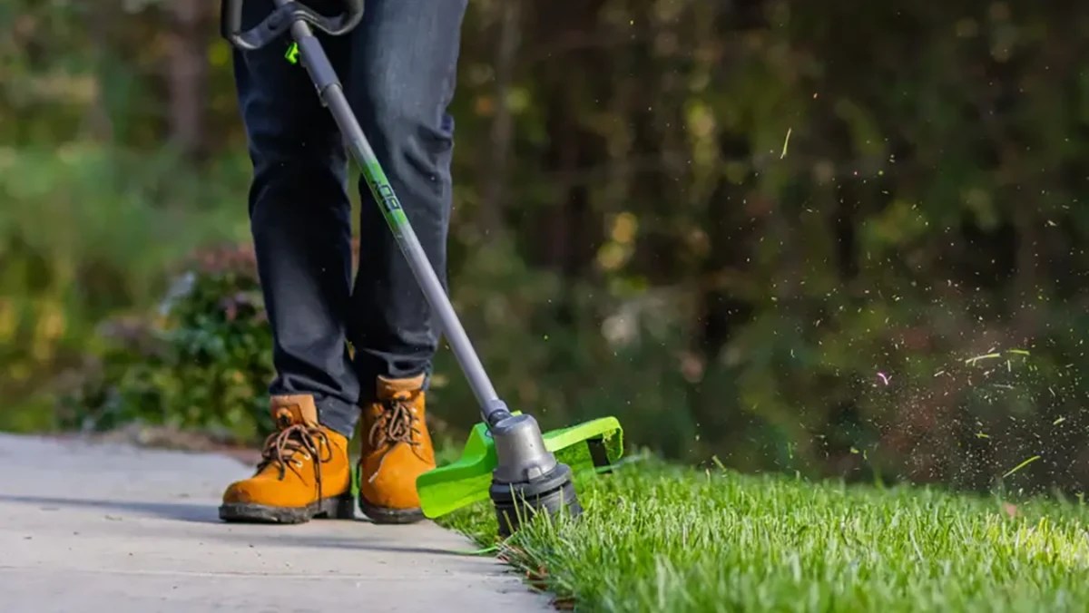 A person using a lawn mower