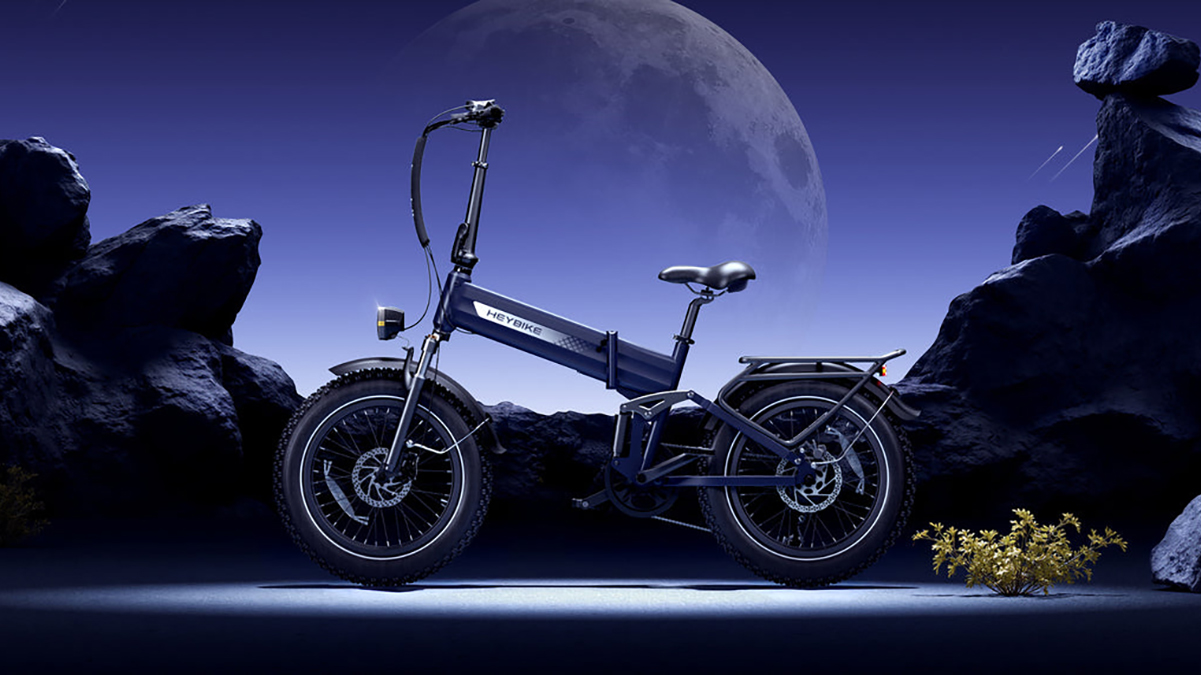 A bicycle with a moon in the background