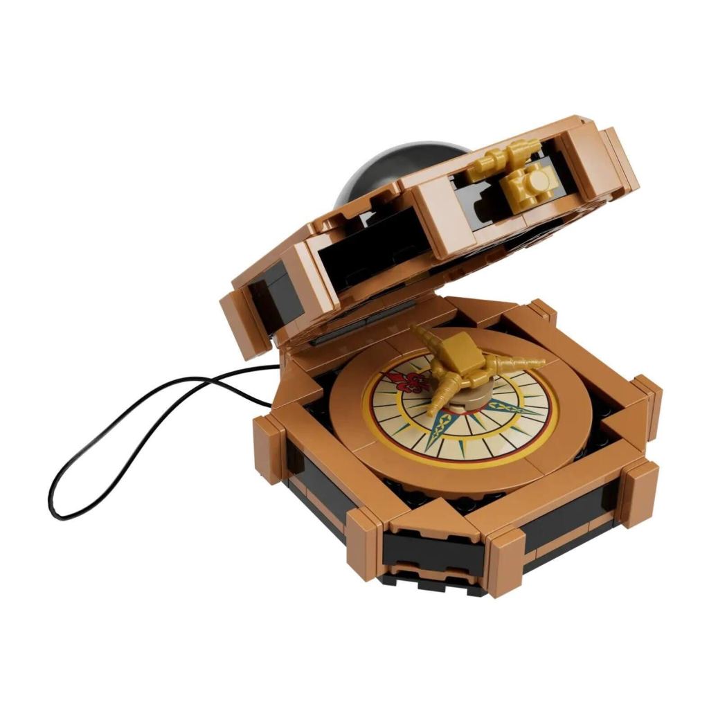 A toy compass with a black ball