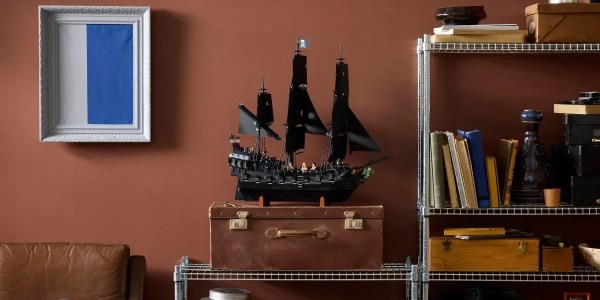 A model ship on a suitcase