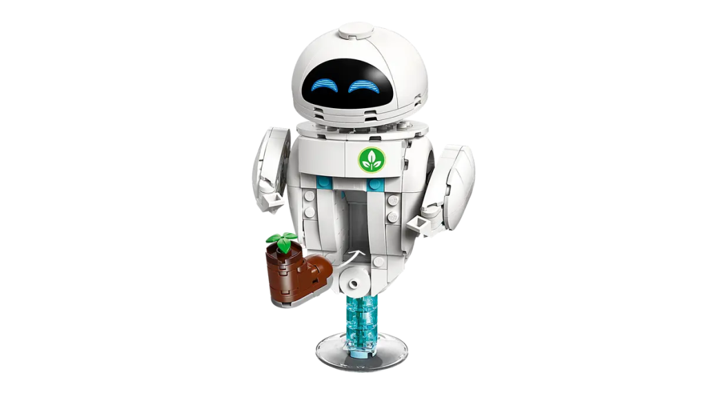 A white robot with blue eyes holding a brown object