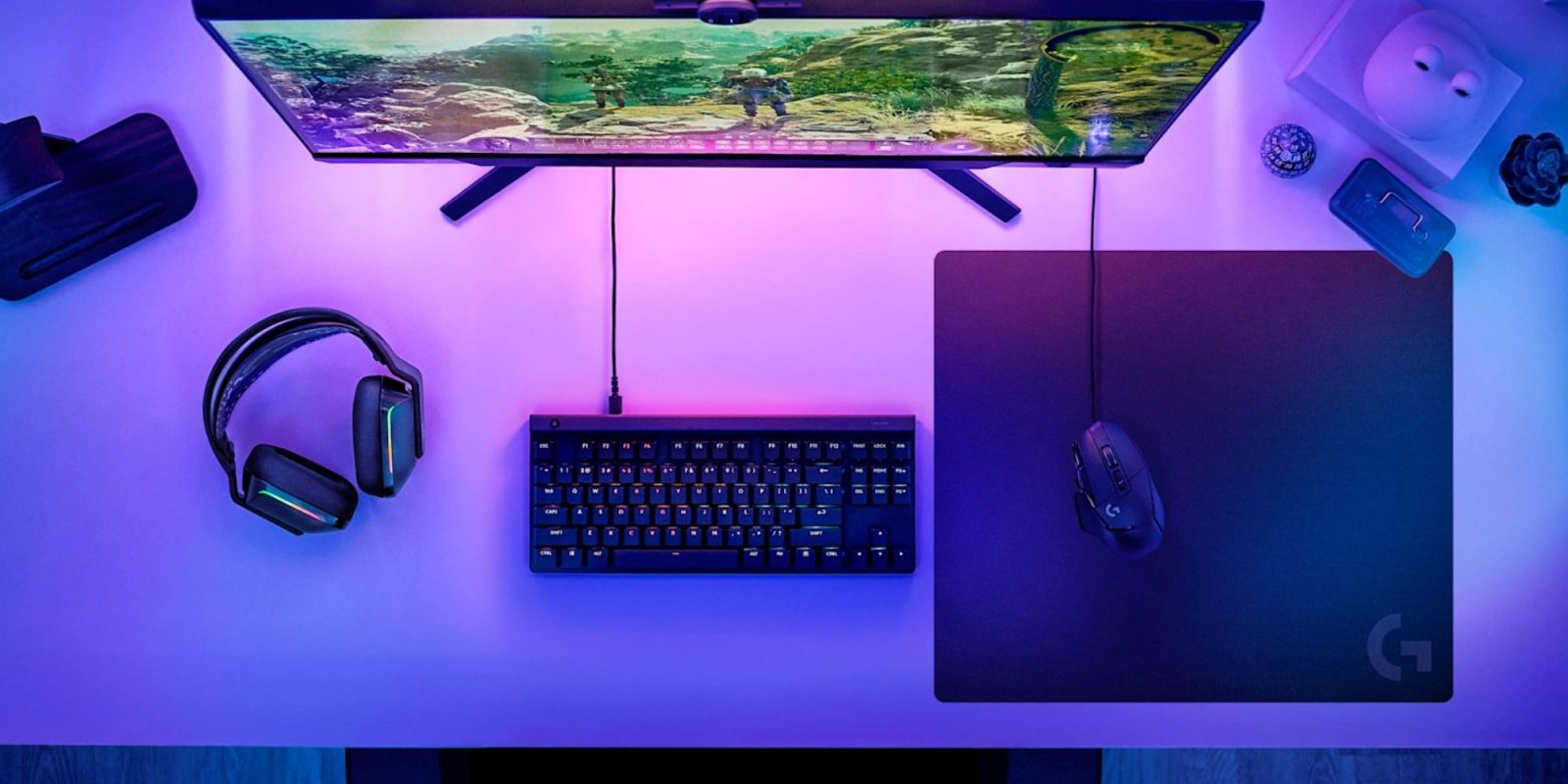 A computer desk with a keyboard and mouse