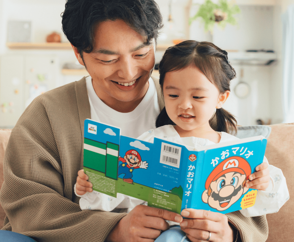 A man and a girl reading a book