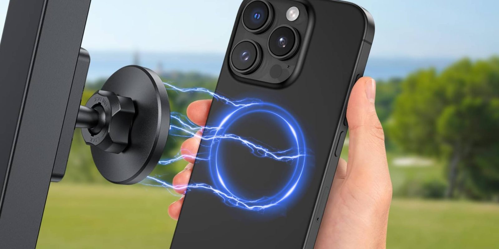 A hand holding a phone with a phone charging