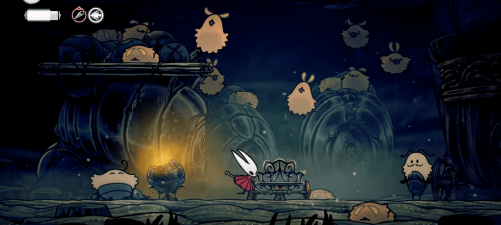 A video game screen with a couple of white rabbits and a cart