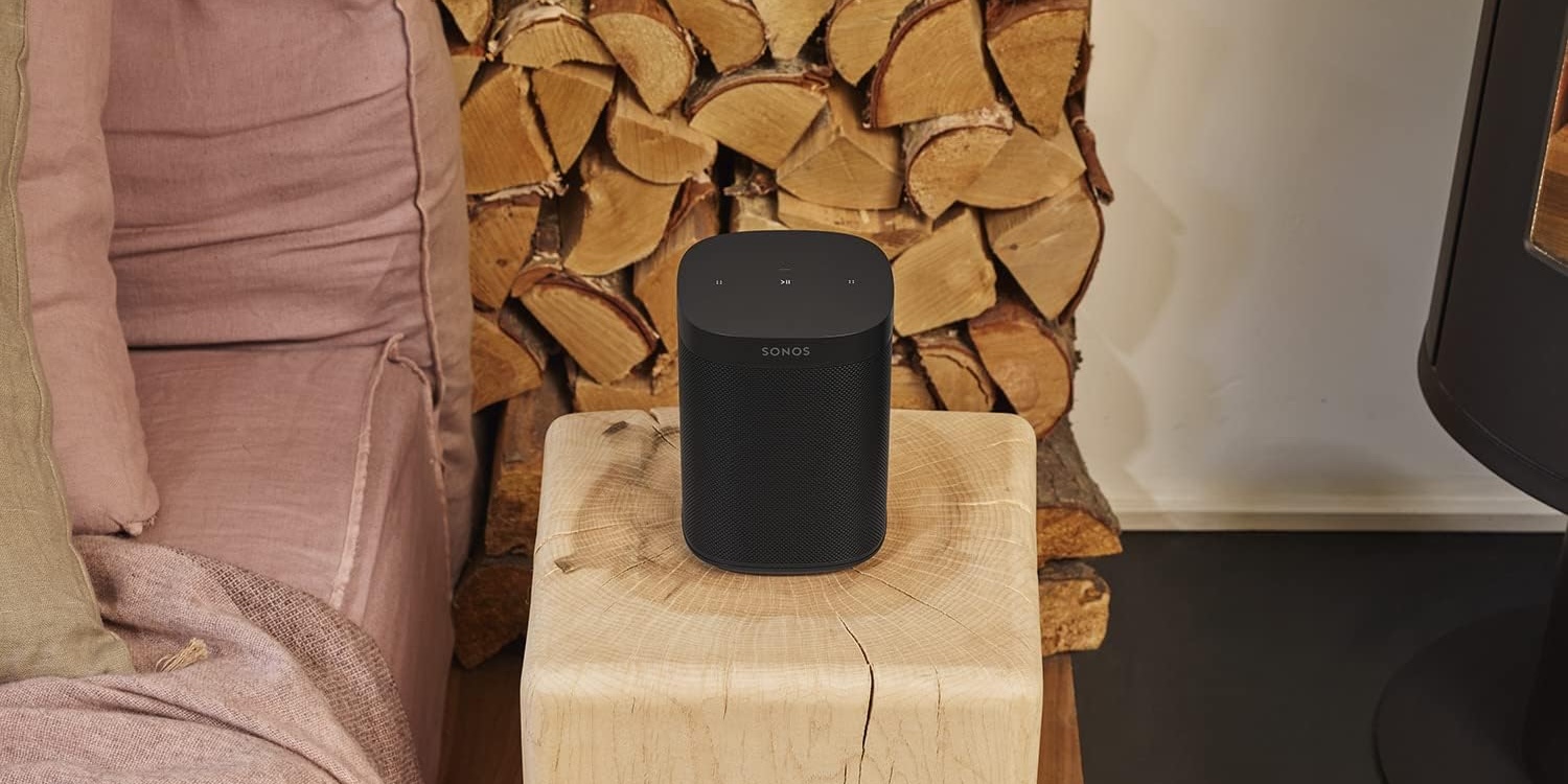 A black speaker on a block