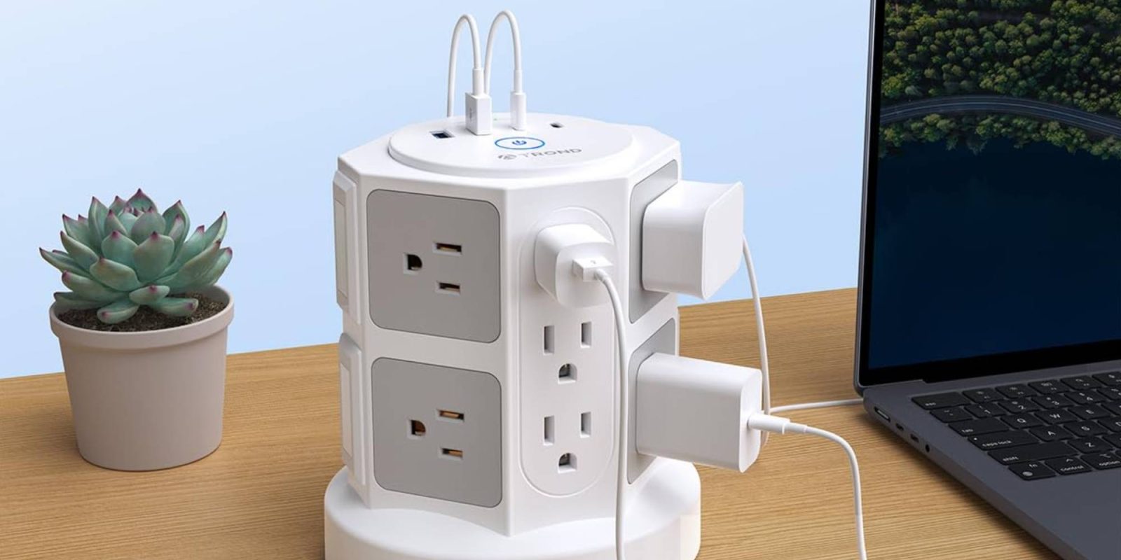 A white electrical outlet with multiple plugs