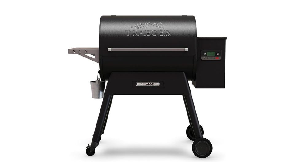 A black barbecue grill with wheels