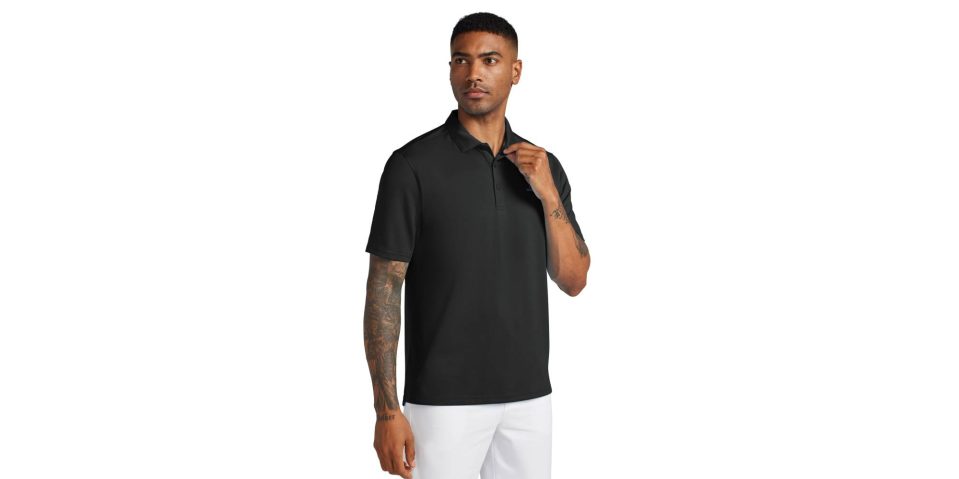 A man wearing a black polo shirt