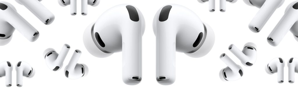 A pair of white wireless earbuds