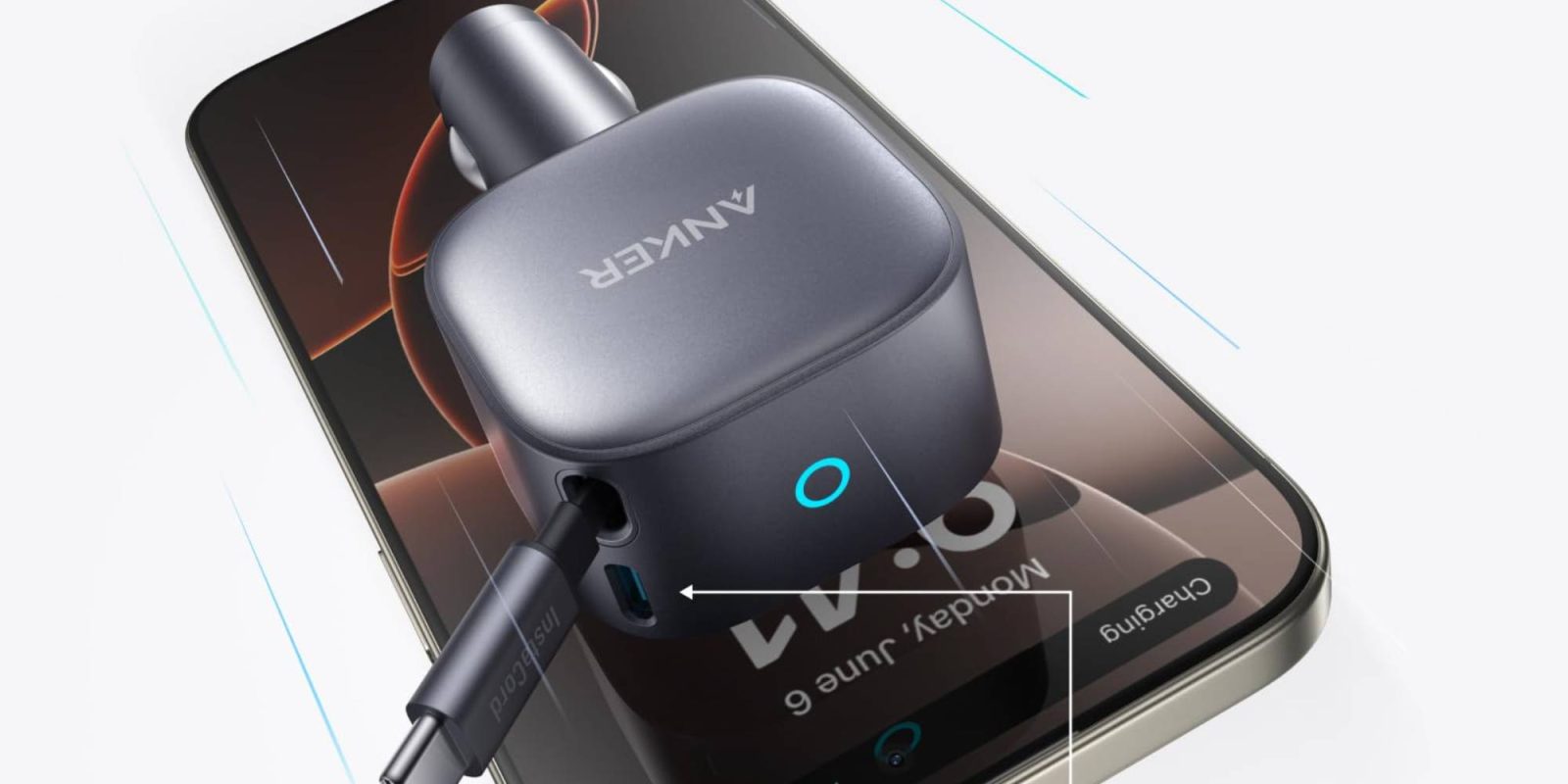A black device with a cord plugged into it