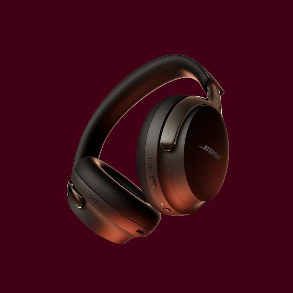 A black headphones on a red background