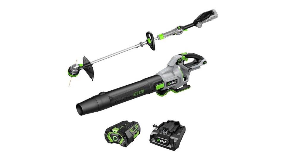 A green and black lawn mower
