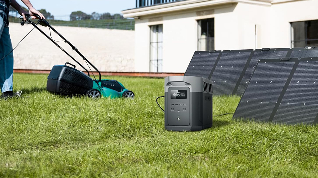 A lawn mower and a machine in a yard