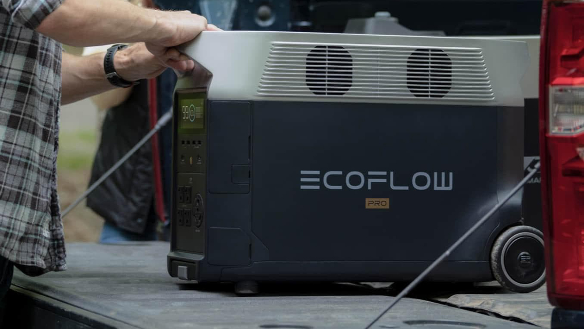 A person holding a machine