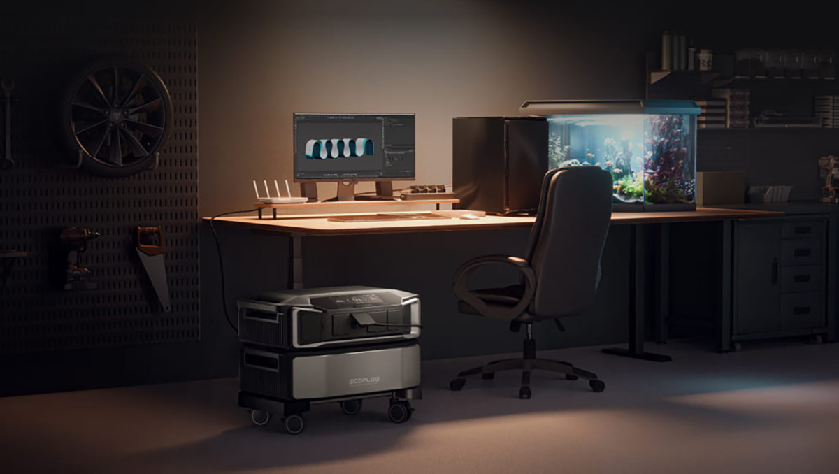 A desk with a computer and a chair