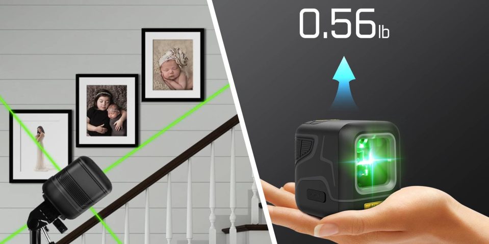 A hand holding a device with green lights