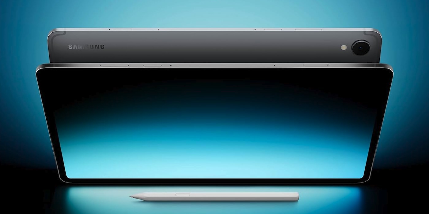 A laptop and stylus on a blue background