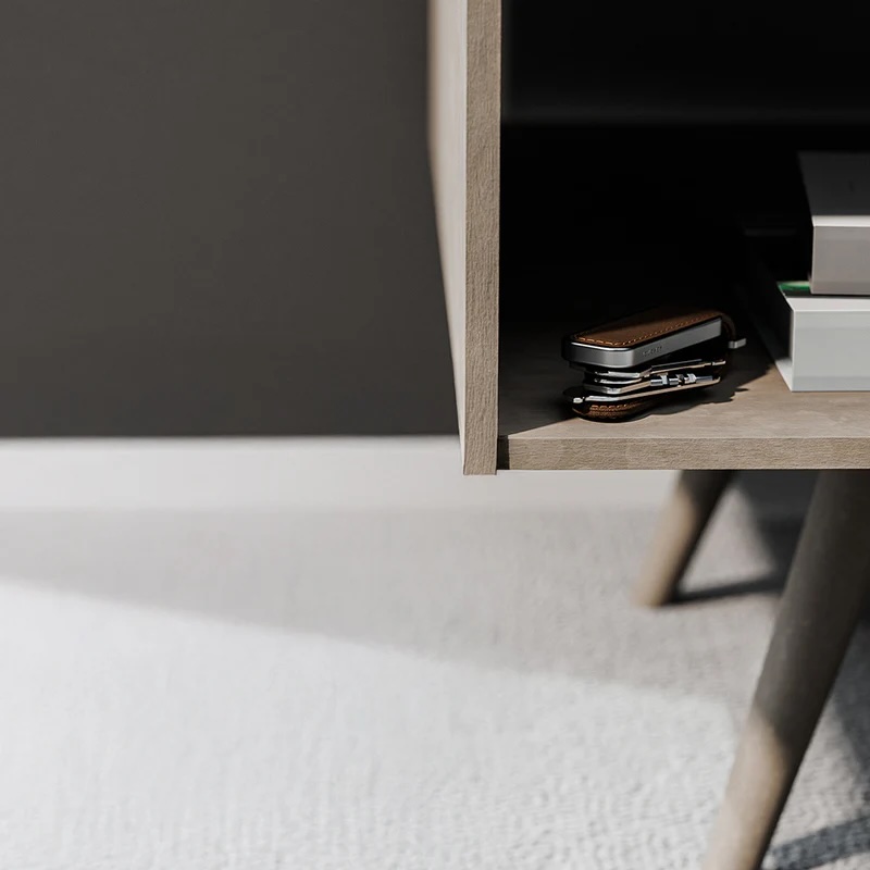 A table with a pocket knife and books