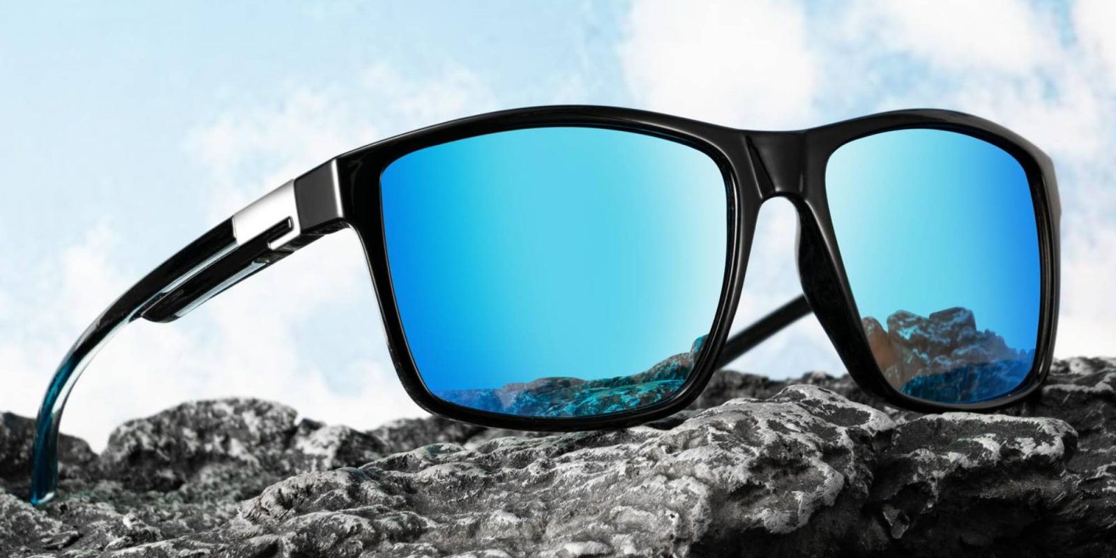 A pair of sunglasses on a rock