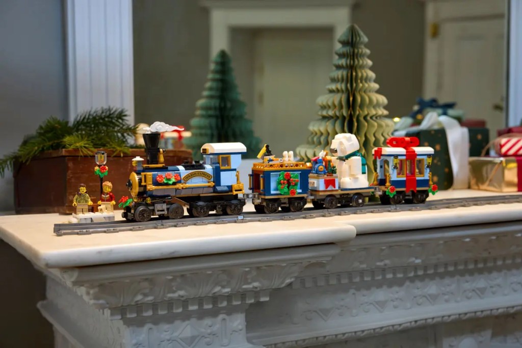 A toy train on a mantle for LEGO Winter Village