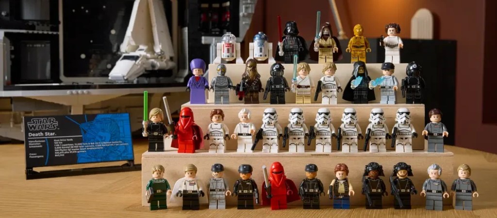 A group of toy figures on a shelf