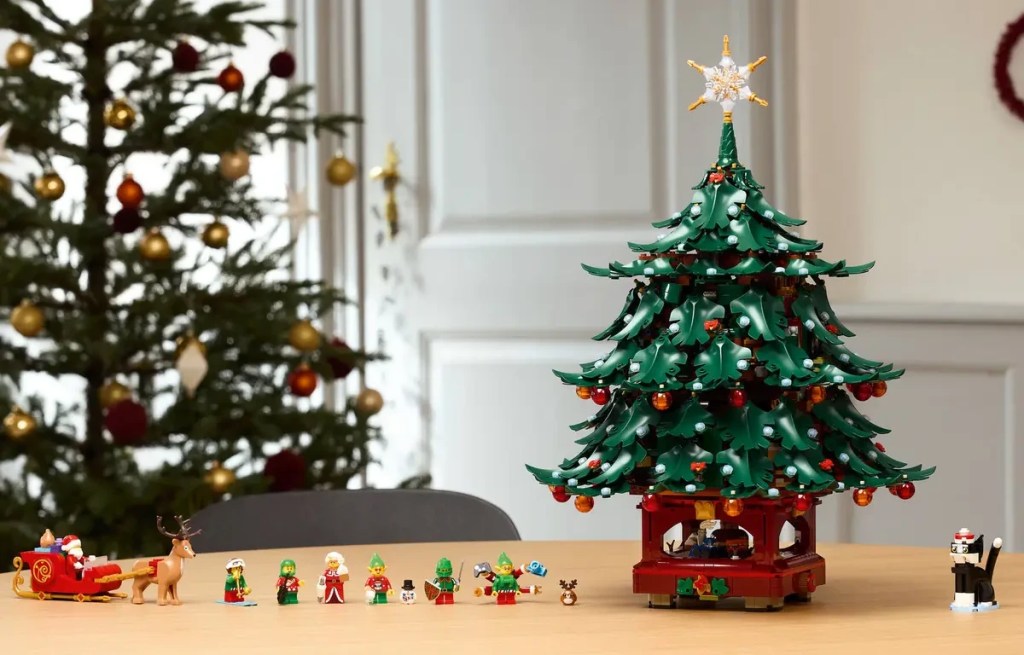 A toy tree with toys on a table for LEGO Winter Village