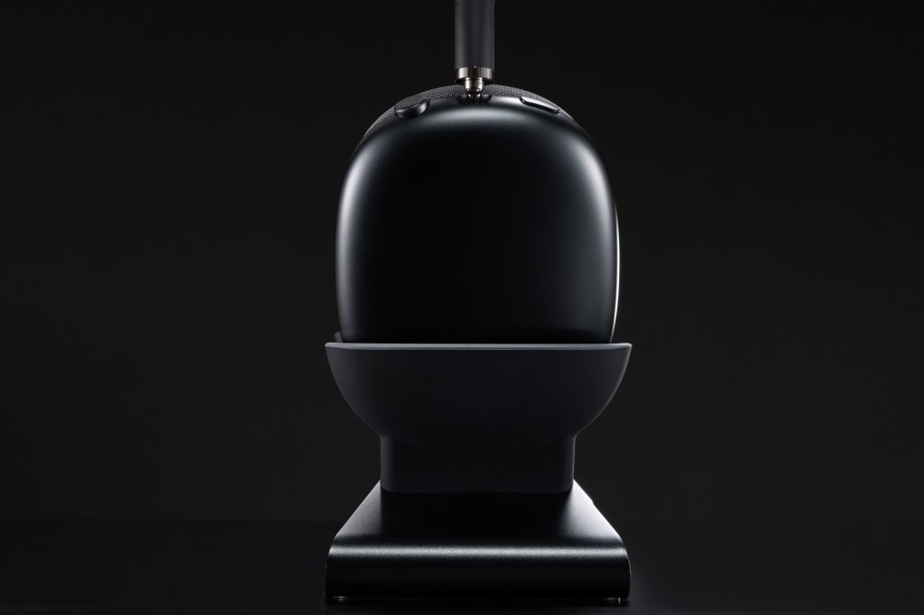 A black object on a stand