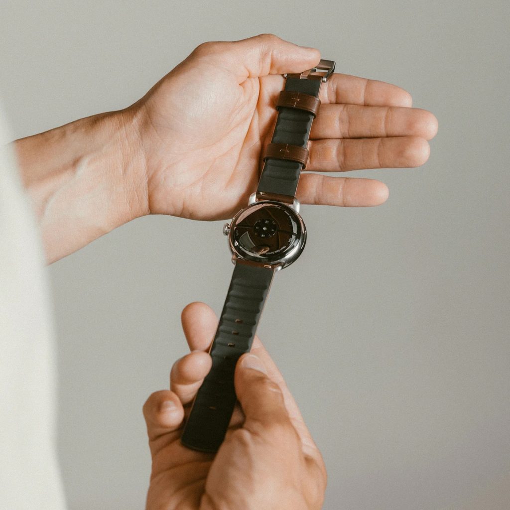 A person holding a watch