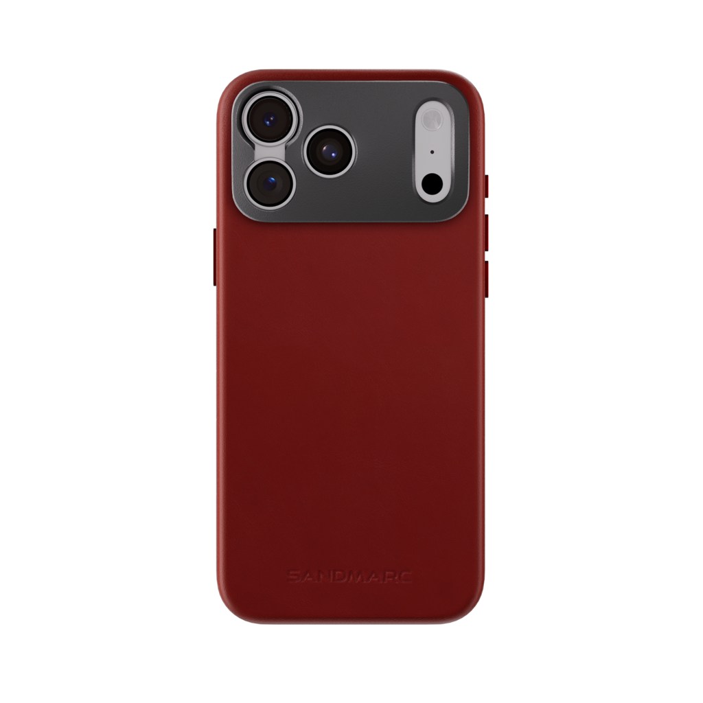 A red cell phone with camera lens