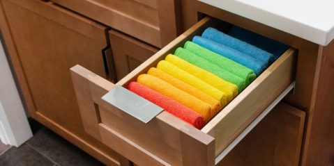 A drawer with towels in it