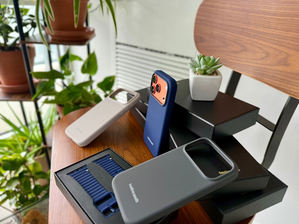 A group of cell phones on a table
