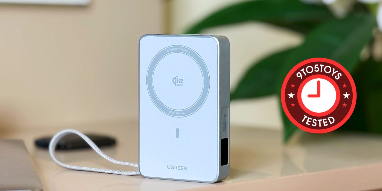 A white rectangular device with a cord attached to it