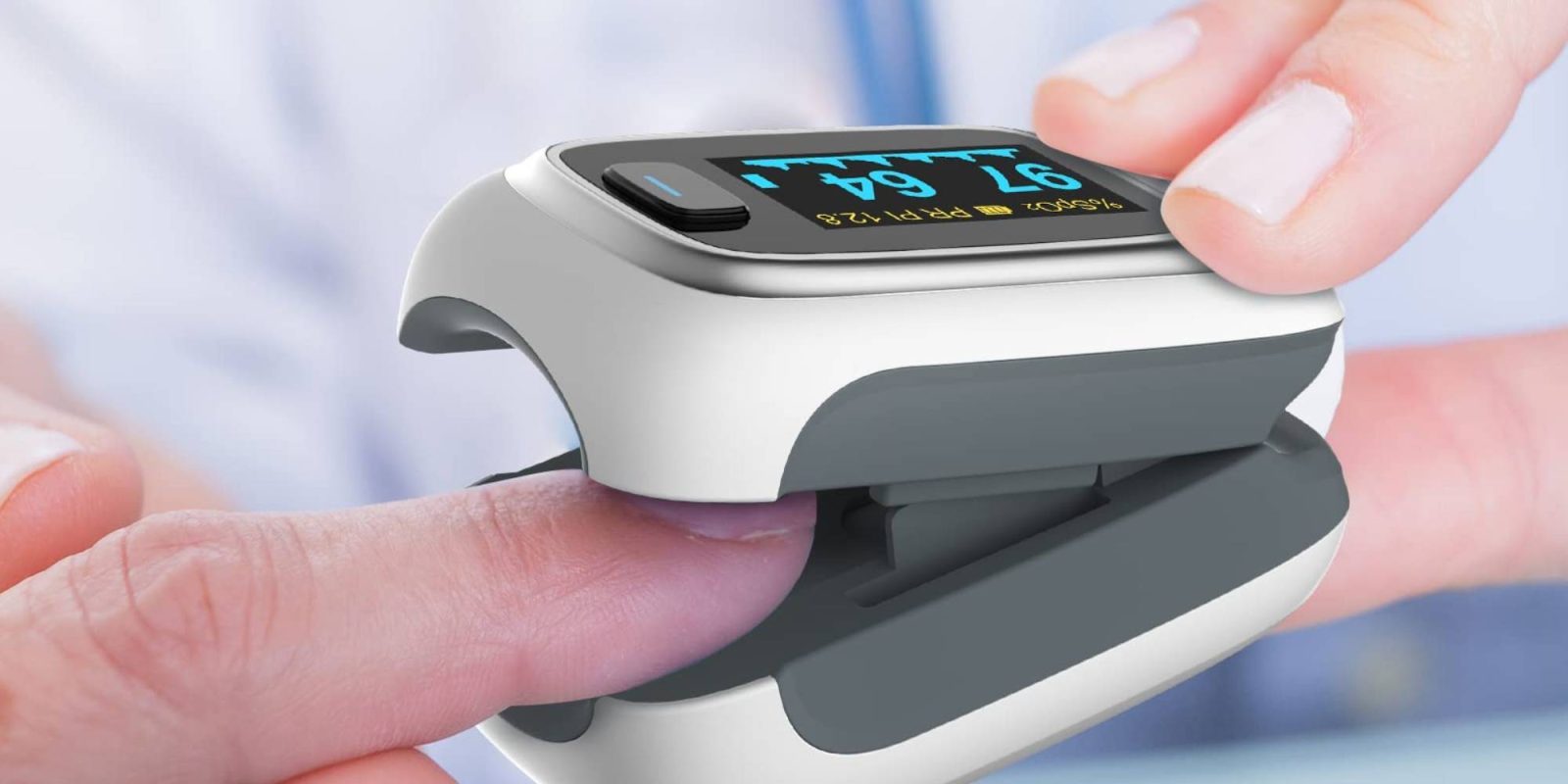 A finger pulse oximeter being measured