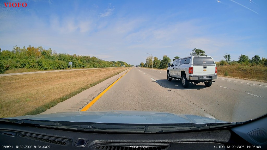 A truck driving on a road