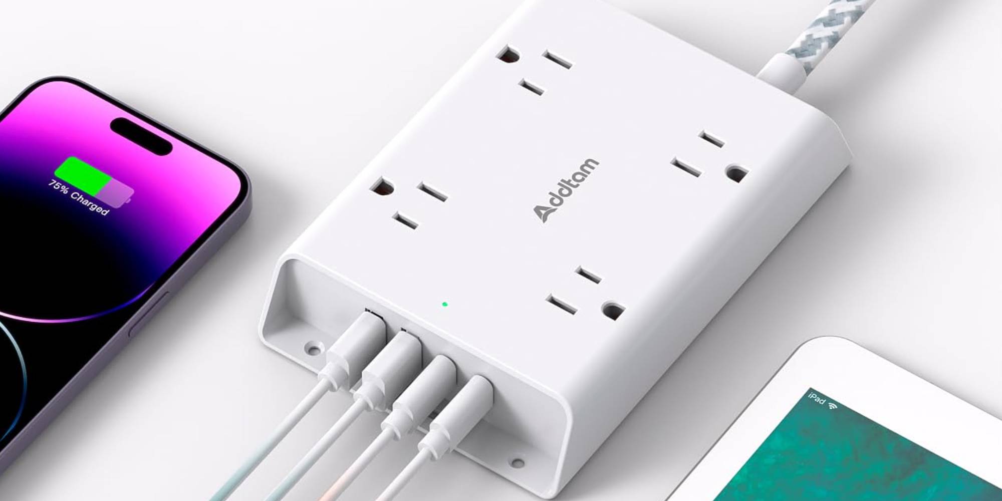 A white electrical outlet with multiple plugs