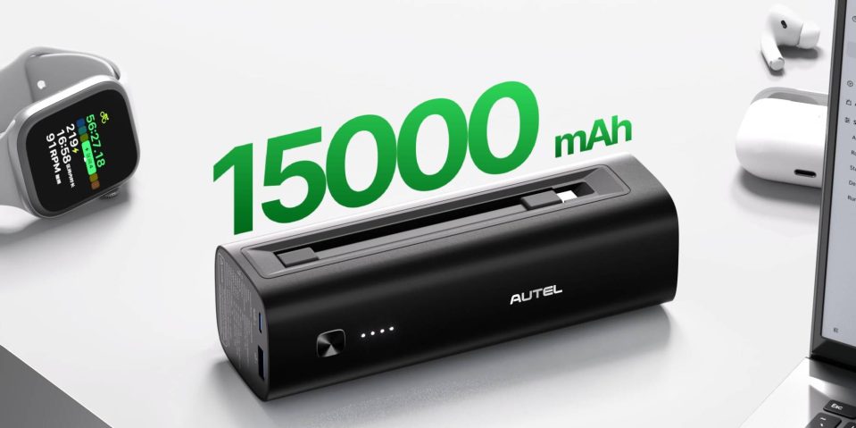 A black rectangular device with a green text