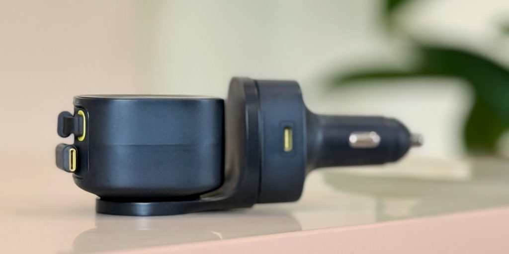 A black device with a charger