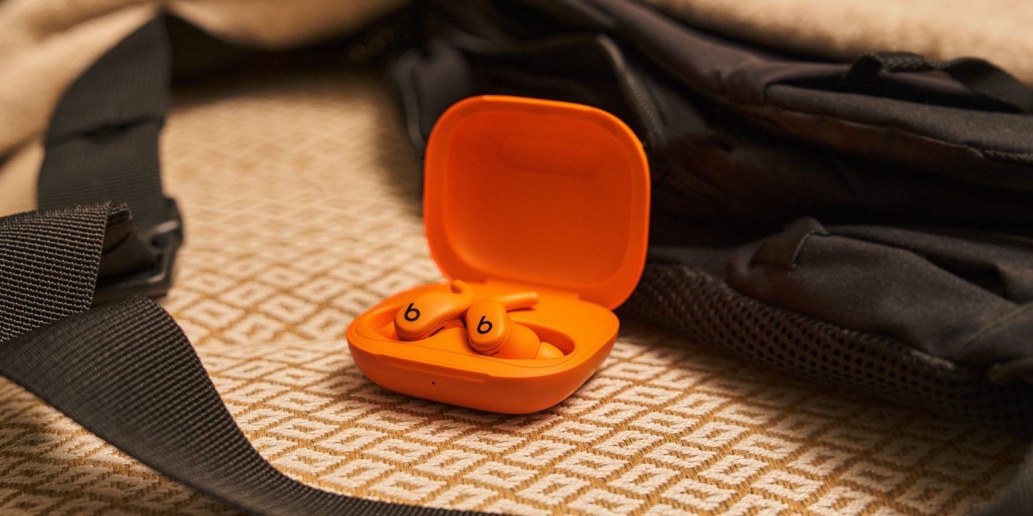 An orange earbuds in a case