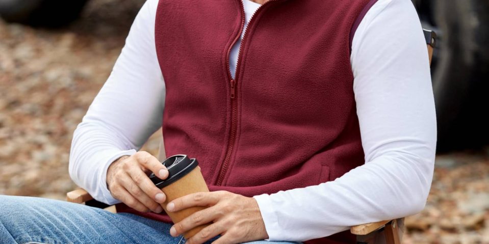 A person holding a cup of coffee