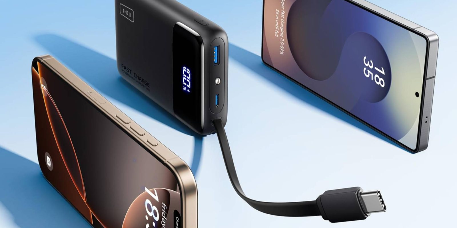 A black power bank connected to a black smartphone