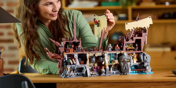 A woman playing with a building block