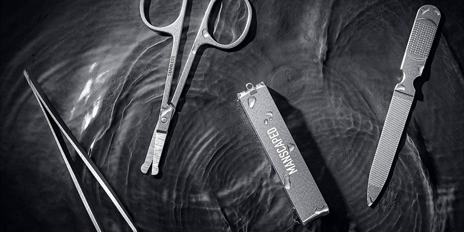 A pair of scissors and a nail clipper